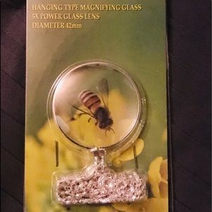 Hanging magnifying glass